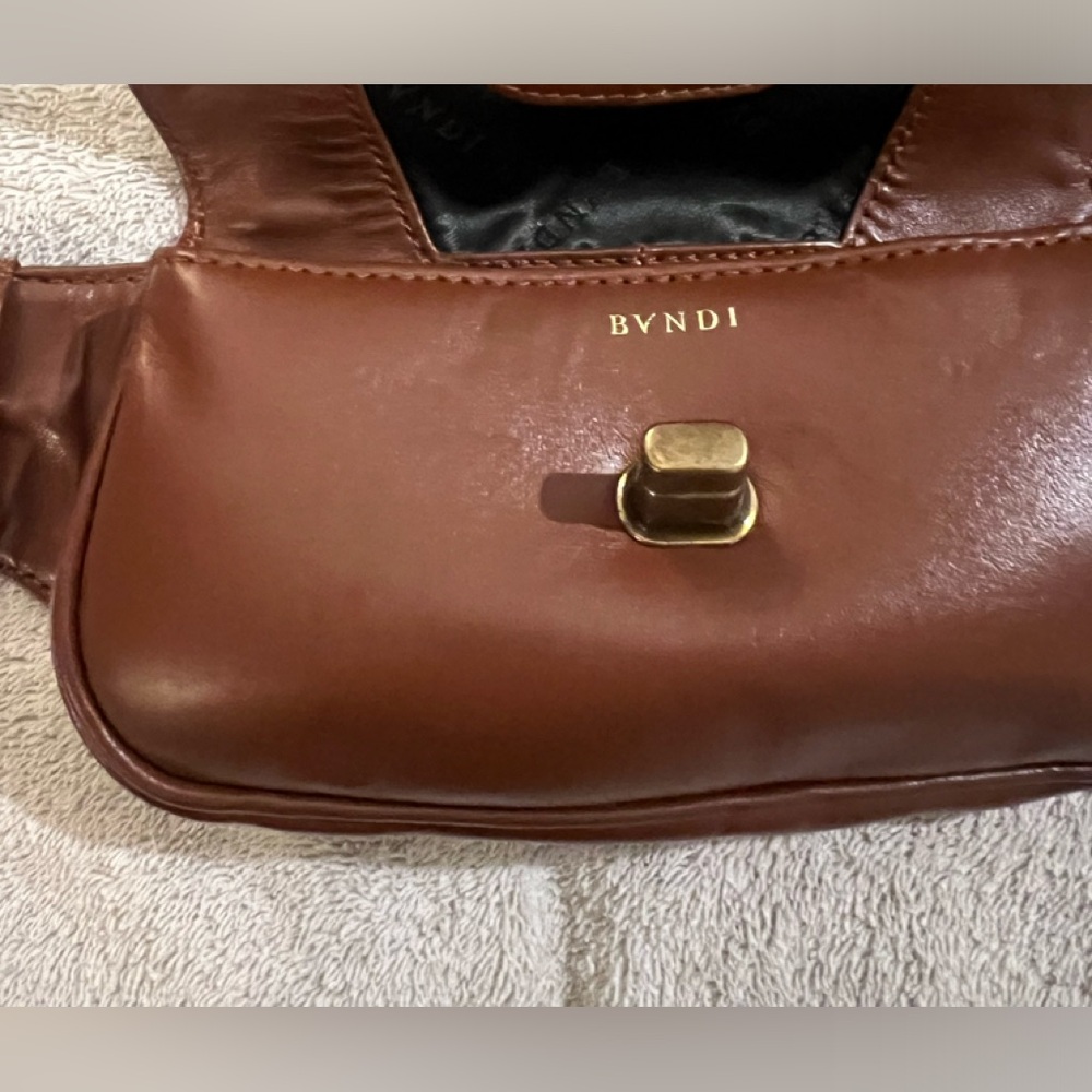 Bvndi double-pouch belt bag, brown leather, new with tags.